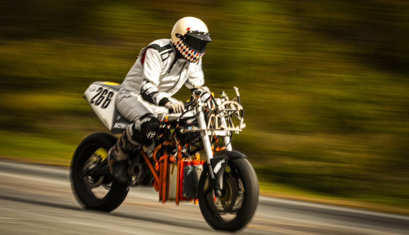 Aditya Mehrotra performs a “shakedown” test — running the hydrogen-powered electric motorcycle at high speeds to ensure that the mechanical and electrical systems hold up. Credits:Photo: Adam Glanzman