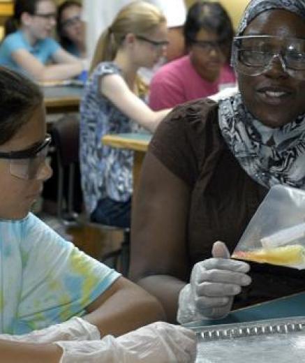 Students performing chemical reaction in a bag